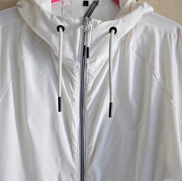 ZERØGRAND Cole Haan White Packable Running Jacket Windbreaker Size L - Picture 3 of 12